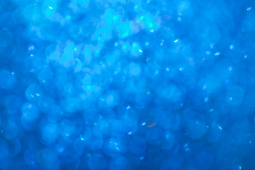 blue bokeh abstract light background.