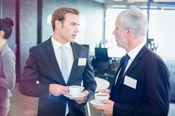 Poster - Businesspeople having a discussion during break time