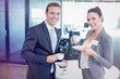 © vectorfusionart - Businessman and businesswoman having tea during breaktime