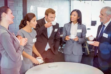 Poster - Businesspeople having a discussion during breaktime