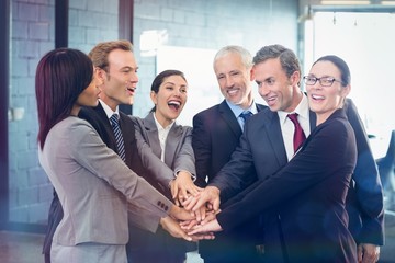 Poster - Businesspeople hands stacked over each other