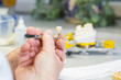 © mmphoto - Dentaltechniker bearbeitet Krone
