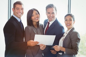 Poster - Portrait of business people standing together
