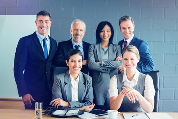 Poster - Portrait of smiling business people in conference room