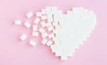 Broken Heart Made Of Sugar Cubes. Rupture Of Relations. Sugar Ki