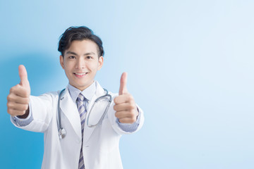 Wall Mural - Male doctor show thumb up