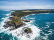Aerial view of Cape Schanck coastline, lighthouse, and Pulpit Rock. Mornington Peninsula, Victoria, Australia
