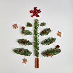 Wall Mural - Christmas Tree made of Winter Foliage and Cinnamon Sticks