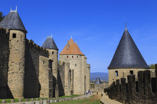 La Cite, Battlements And Spiky Turrets From Les Lices, Carcassonne, Languedoc-Roussillon, France