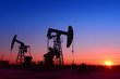 © hanmaomin - The beam pumping unit is homework, sunset in oil field