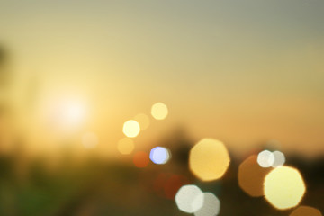 blurred background : sunset landscape with bokeh sun light abstract background. blur concept. retro 
