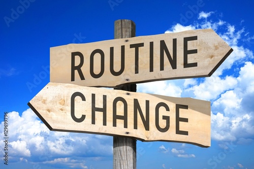 Fotografía Routine, change - wooden signpost
