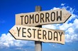 Tomorrow, yesterday - wooden signpost