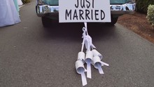 Just Married Car With Cans In Slow Motion