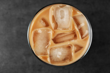 Poster - Iced coffee with milk on grey background