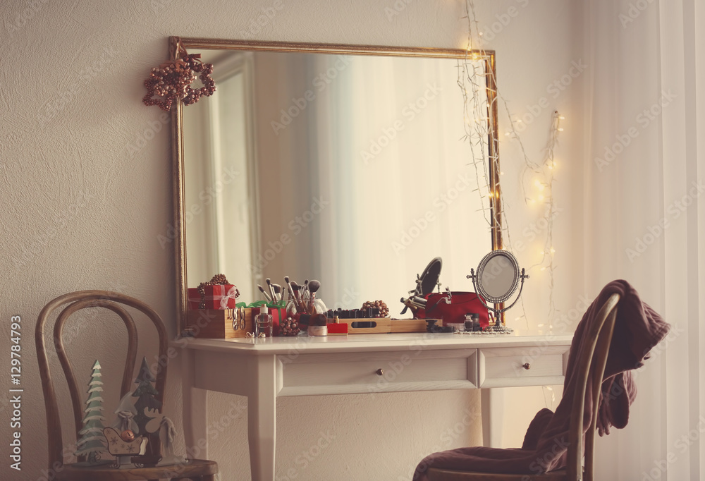 Cosmetics on table in room interior