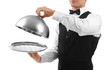 © Africa Studio - Male waiter holding cloche and tray on white background