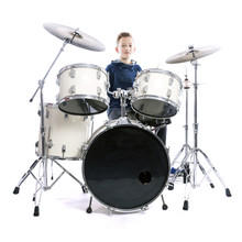 Teenage Boy Behind Drum Kit In Studio