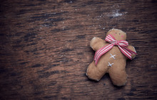 Gingerbread Man On A Dark Background. Free Space For Text. Studio Shooting. Subject Shooting.