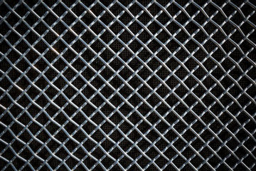 metal mesh or aluminum grid on black background