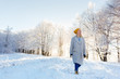 © Myvisuals - Image of pretty woman walking in snowy mountains. Portrait of fe
