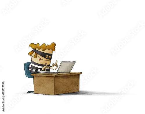 Fotografía Thief with mask is sitting and typing on a laptop