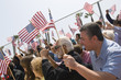 © moodboard - Diverse group of people with American flag during a rally