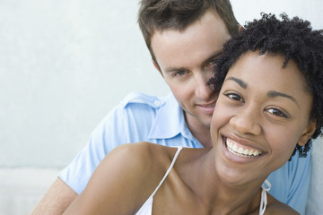 Closeup portrait of loving young couple smiling