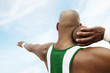 © moodboard - Closeup rear view of a shot putter preparing to toss shot put against the sky