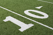 © MDBPIXS - 10 yard line on American football field in stadium