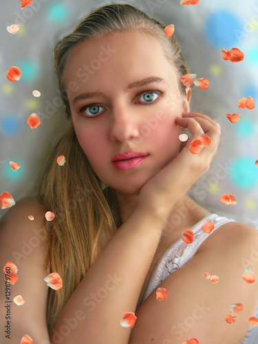 Beautiful Blonde Girl With Tanned Skin And Blue Eyes Buy This