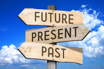 Wall Mural - Future, present, past - wooden signpost