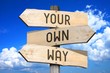 Your own way - wooden signpost