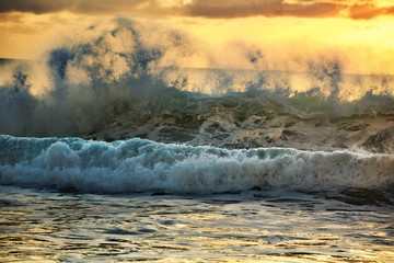 Fototapete - GreenYellow Blue sunset rough shorebreak ocean wave on orange background. Sea pattern marine template for travel design