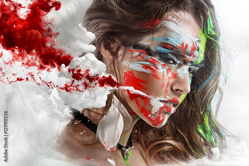 Fotografía Halloween Painted beautiful woman face, artistic make up, body and face art, close up
