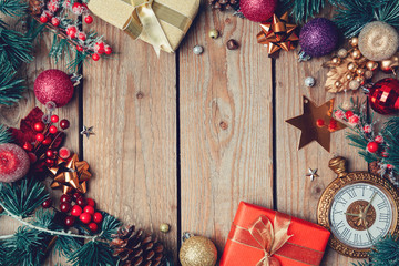 Poster - Christmas holiday wooden background with beautiful decorations and ornaments. View from above. Flat lay