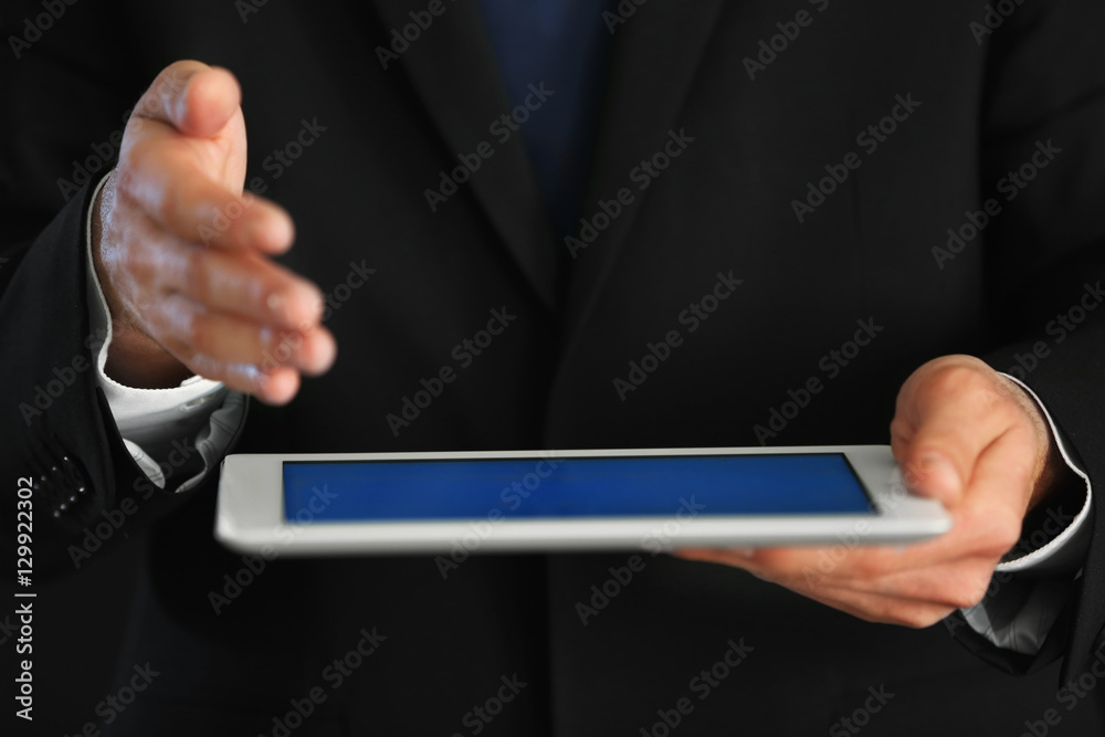 Businessman with tablet, closeup