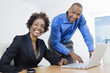 © MDBPIXS - Portrait of an African American business people working together in office