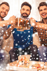 Canvas Print - Laughing friends having gatherings and clinking with beer on xma