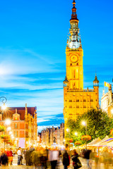 Wall Mural - Night view on the illuminated town hall in the old town of Gdansk, Poland