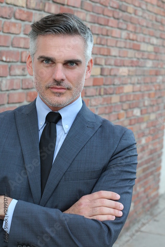 Elegant Man With Salt And Pepper Hair Close Up Buy This Stock