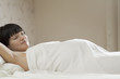 © MDBPIXS - Pregnant woman sleeping on bed
