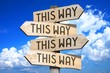 canvas print picture - This way - wooden signpost