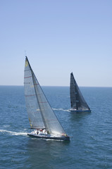 Wall Mural - View of two yachts competing in team sailing event