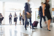 © MDBPIXS - Blurred motion of business people at convention center