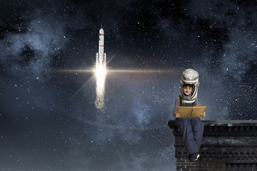 Wall Mural - He want to become astronaut . Mixed media