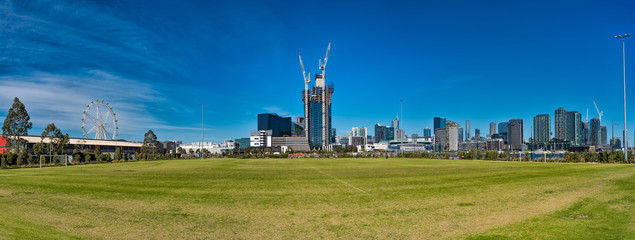 A skyline view of Melbourne, Australia from Docklands including the Southern Star Ferris Wheel