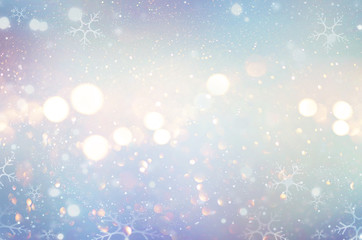 christmas glow winter background. defocused snow background with blinking stars and snowflakes