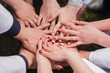 © sharshonm - Hands of young people in the nature