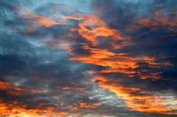 Dramatic bright orange sunset sky